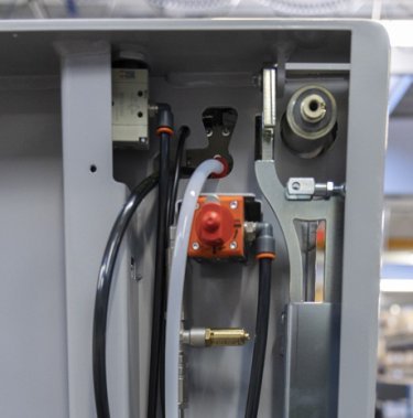 At what intervals does a baler need servicing?