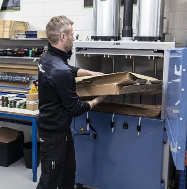 Are there any precautions to take while operating a baler?