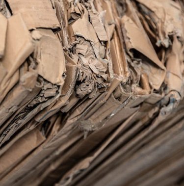 Which type of cardboard is best for use in a baler?